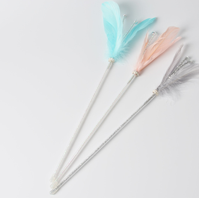 Long feather with bell